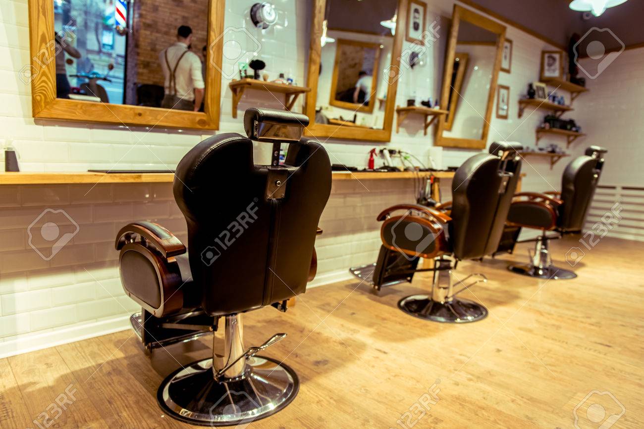 Stylish barber shop. Designed with white brick and wood. Take care of your hairstyle here! - 52671353 Stylish barber shop. Designed with white brick and wood. Take care of your hairstyle here! - 52671353