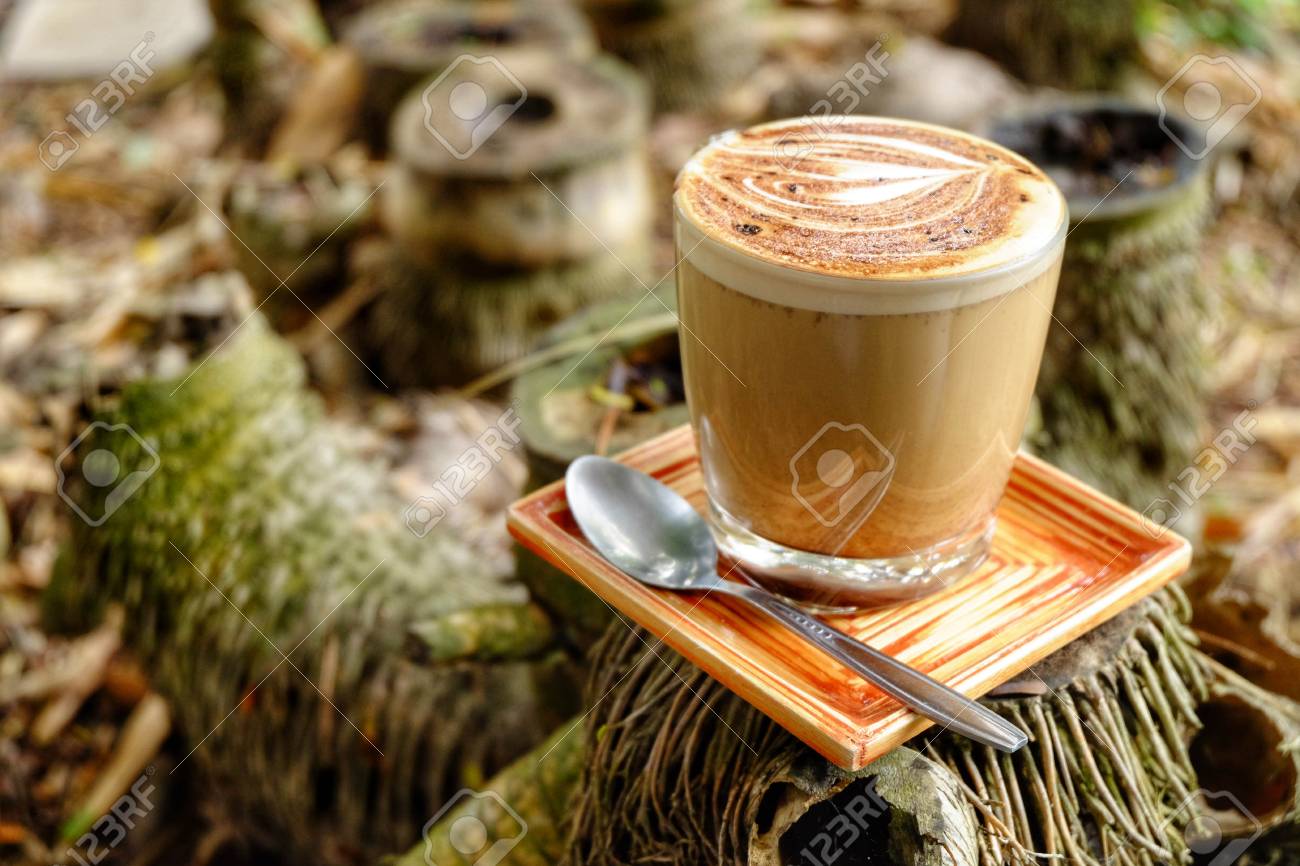 mocha coffee mug mocha coffee cup put on bamboo stump stock photo
