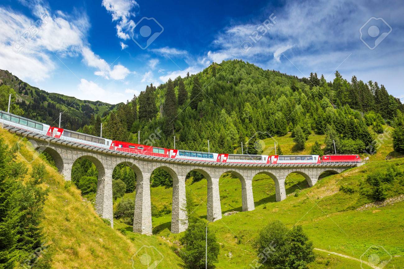 Train on famous landwasser Viaduct bridge.The Rhaetian Railway section from the Albula/Bernina area (the part from Thusis to Tirano, including St Moritz) was added to the list of UNESCO World Heritage Sites, Switzerland, Europe. - 66982356 Train on famous landwasser Viaduct bridge.The Rhaetian Railway section from the Albula/Bernina area (the part from Thusis to Tirano, including St Moritz) was added to the list of UNESCO World Heritage Sites, Switzerland, Europe. - 66982356
