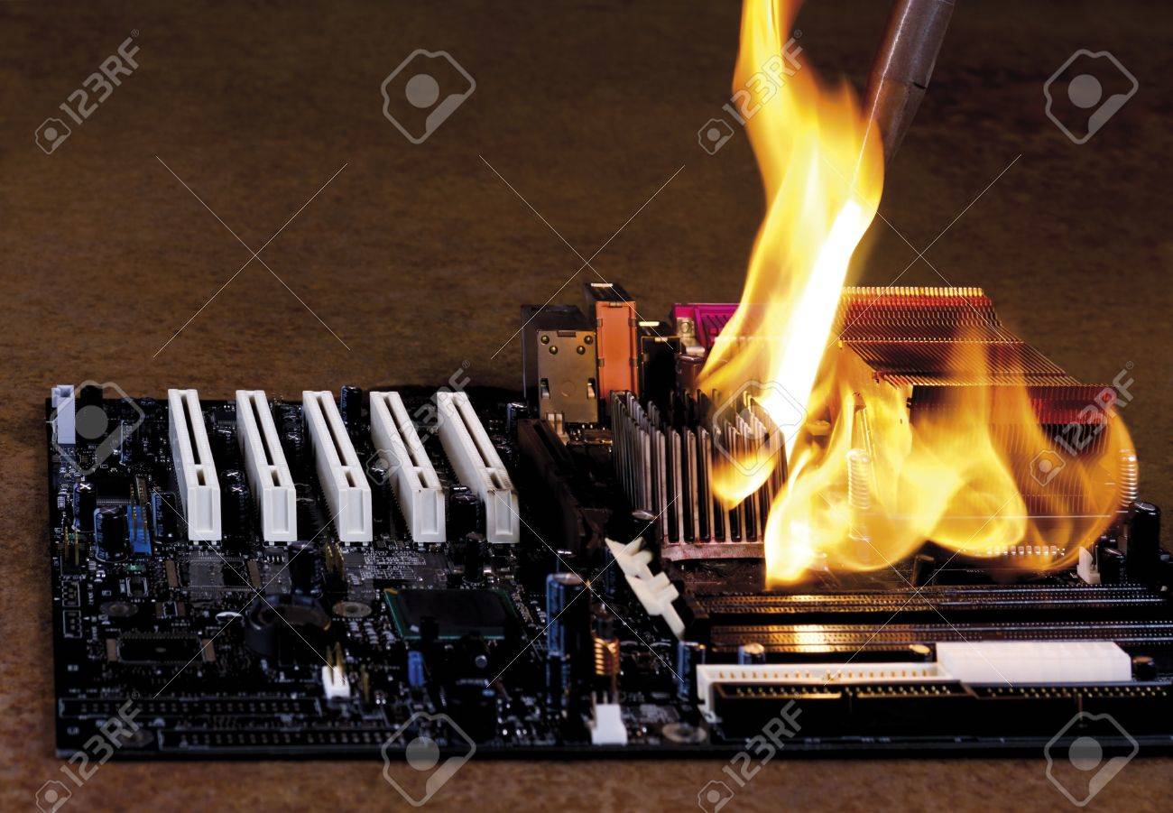 burning computer part on rusty background modern mainbord burning computer