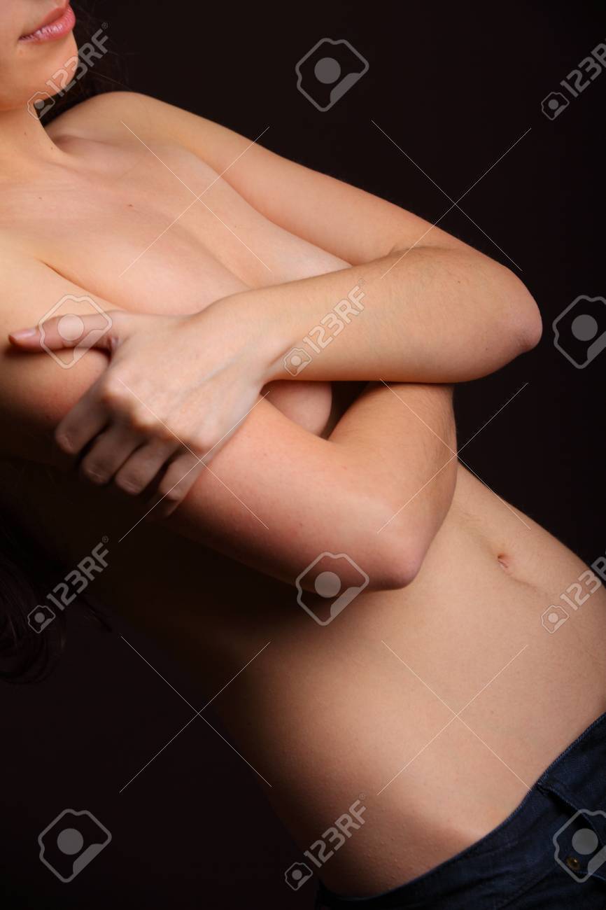 Sexy Topless Woman Holding And Covering Her Boobs Stock Photo, Picture and  Royalty Free Image. Image 19641994.