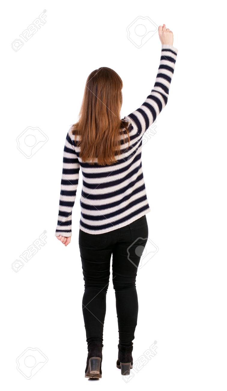 ビジネスの女性の後ろ姿 勝利のサインにまで彼の拳を発生します 勝利のサインにまで彼の拳を発生します リア人のコレクションを表示します 人の裏面表示 白い背景に分離されました ストライプのジャケットの女の子は嬉しそうに手を挙げた の写真素材 画像