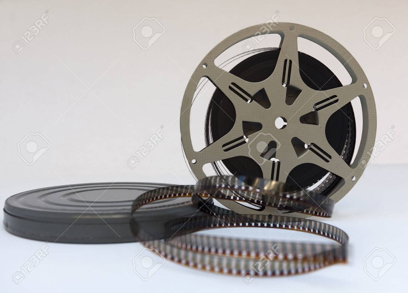 Vintage 1940s Home Movie Canister And Film Reel. Stock Photo, Picture and  Royalty Free Image. Image 80540655., image size:1300x933