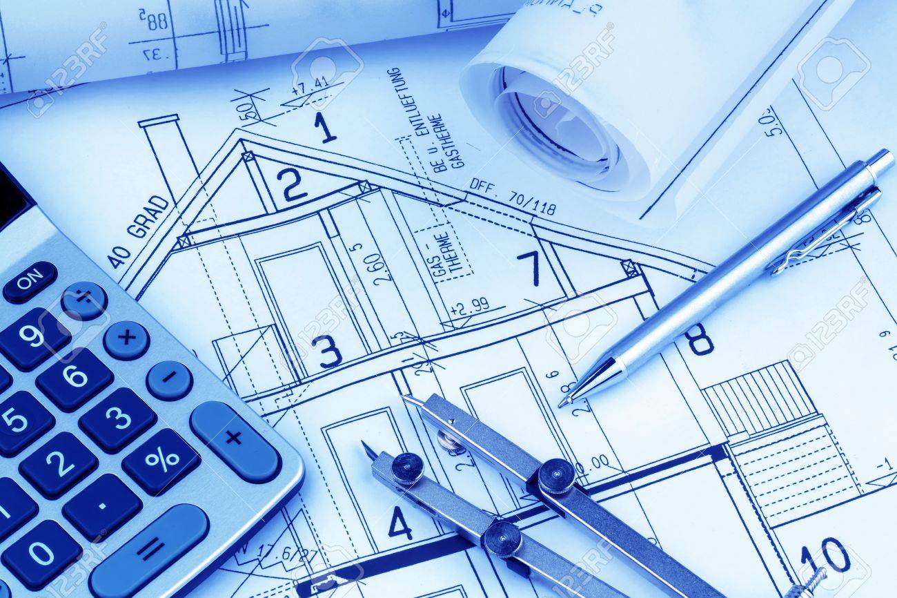 an architect s blueprint with a calculator symbolic for funding and planning of a new home - 19089403 an architect s blueprint with a calculator symbolic for funding and planning of a new home - 19089403