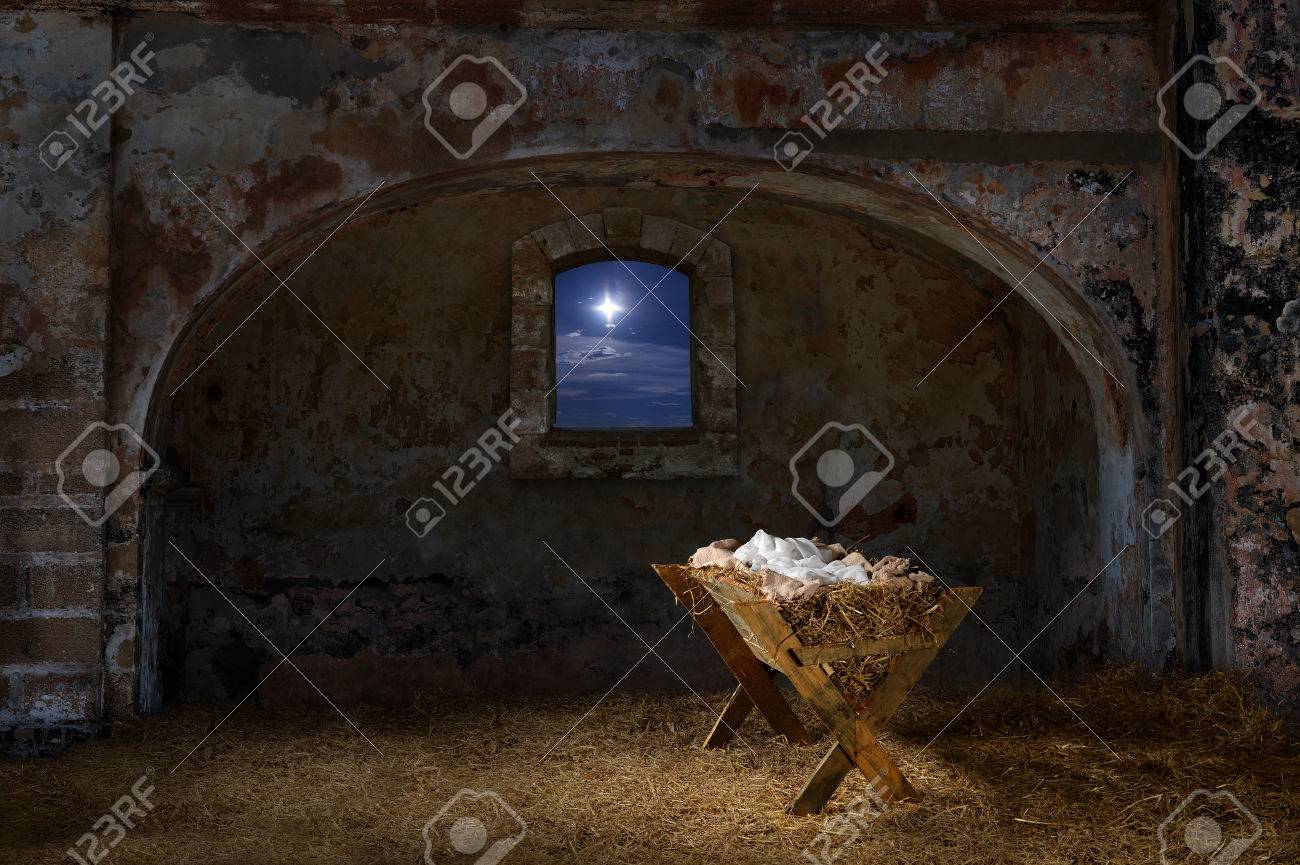Empty manger in old barn with window showing the Christmas star - 63773857 Empty manger in old barn with window showing the Christmas star - 63773857