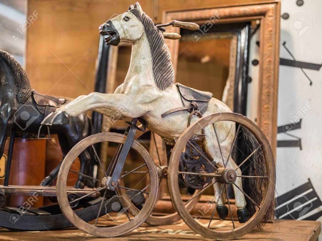 antique hobby horse on wheels