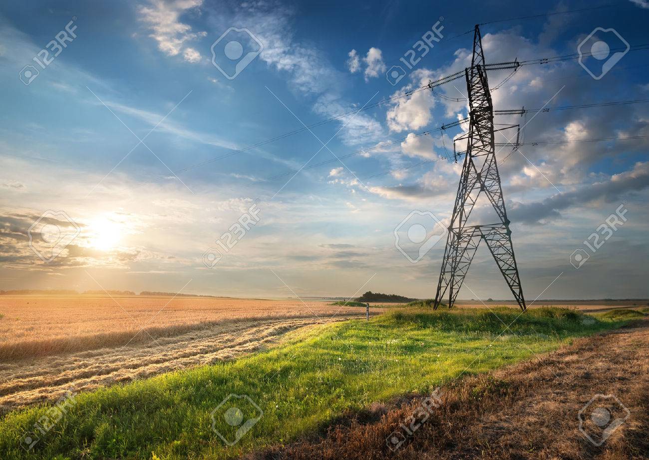 Electric pole in the autumn field at sunrise - 34349209 Electric pole in the autumn field at sunrise - 34349209