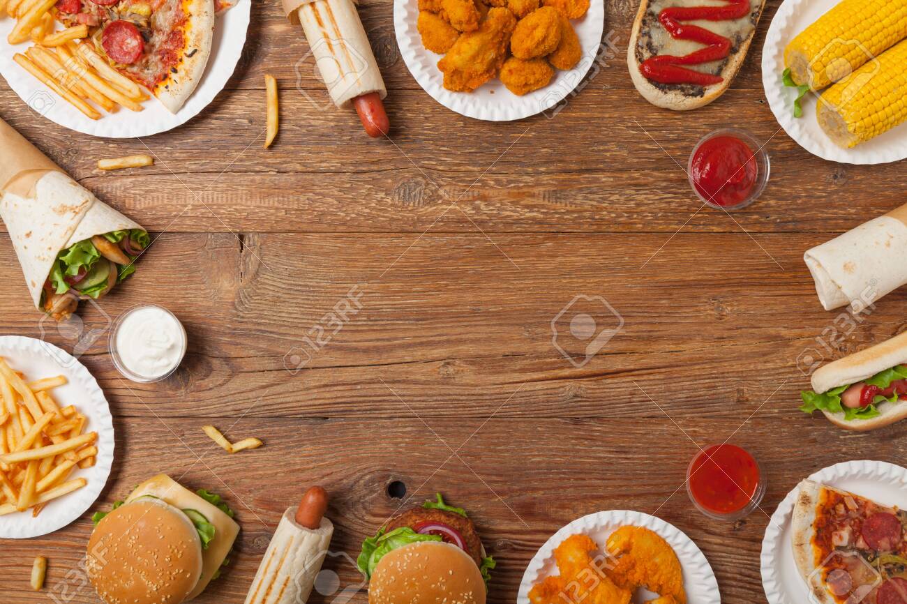 Mix Of Fast Food, Street Dishes. Background With Copy Space. Top View.  Natural Wooden Background. Stock Photo, Picture And Royalty Free Image.  Image 138448286.