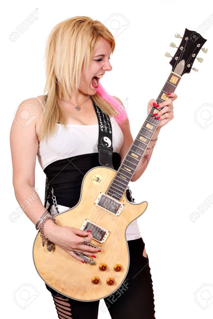 女の子の悲鳴を上げるし エレキギターを演奏 の写真素材 画像素材 Image