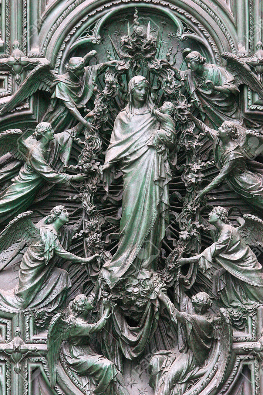 Duomo Of Milano. Virgin And Child Sculpture. Italy.の写真素材