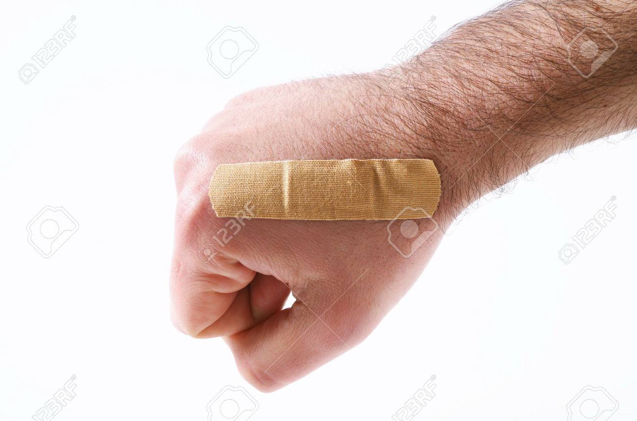 male hand with the band aid stock photo picture and royalty free