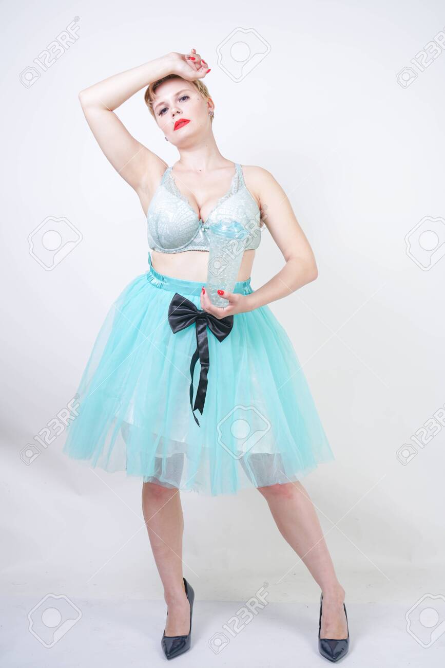 Plus Size Woman With Short Hair Wear Bra And Tutu Skirt Stock