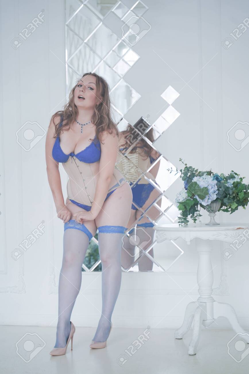 Pretty Chubby Woman In Fashion Blue Lingerie In Her White Room Indoors  Alone Stock Photo, Picture and Royalty Free Image. Image 130170550.