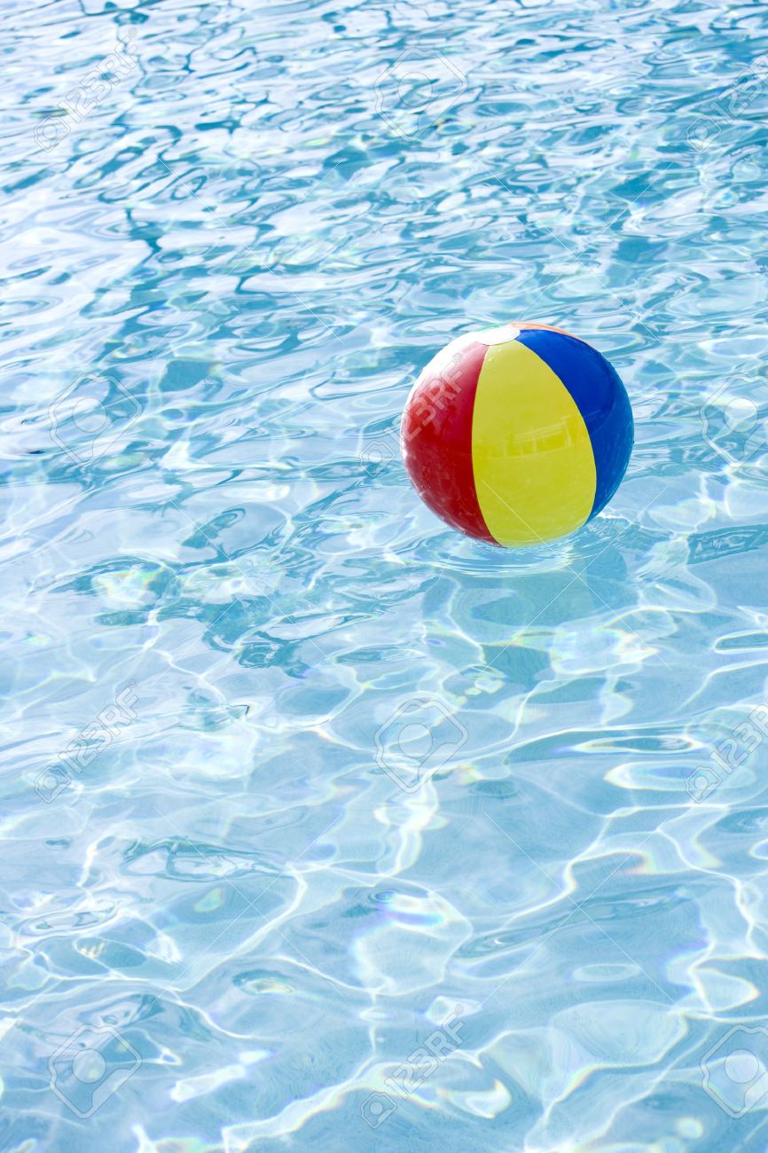 Pool Water With Beach Ball beach ball floating on surface of swimming pool water stock photo Pool Water With Beach Ball beach ball floating on surface of swimming pool water stock photo