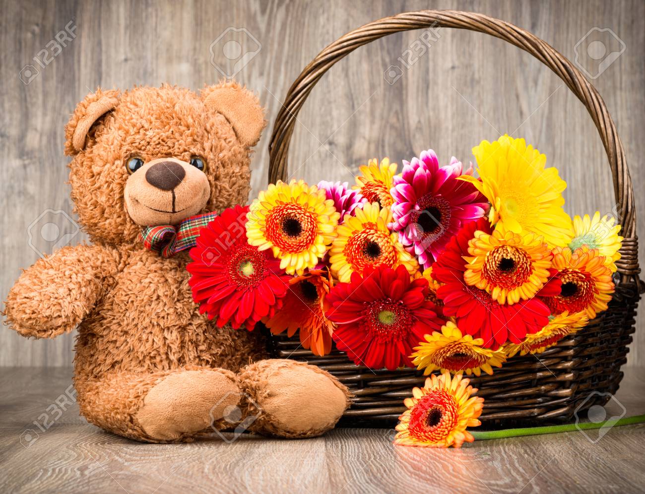 beautiful flowers with teddy bear
