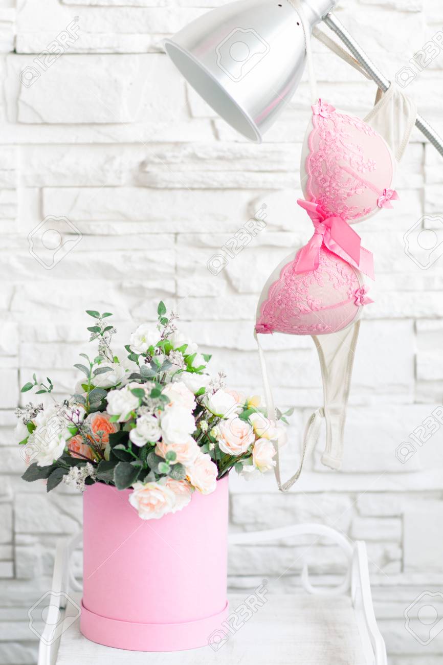 Female Lingerie On Lamp Above Vase With Flowers Nightstand In Stock Photo Picture And Royalty Free Image Image 58962304