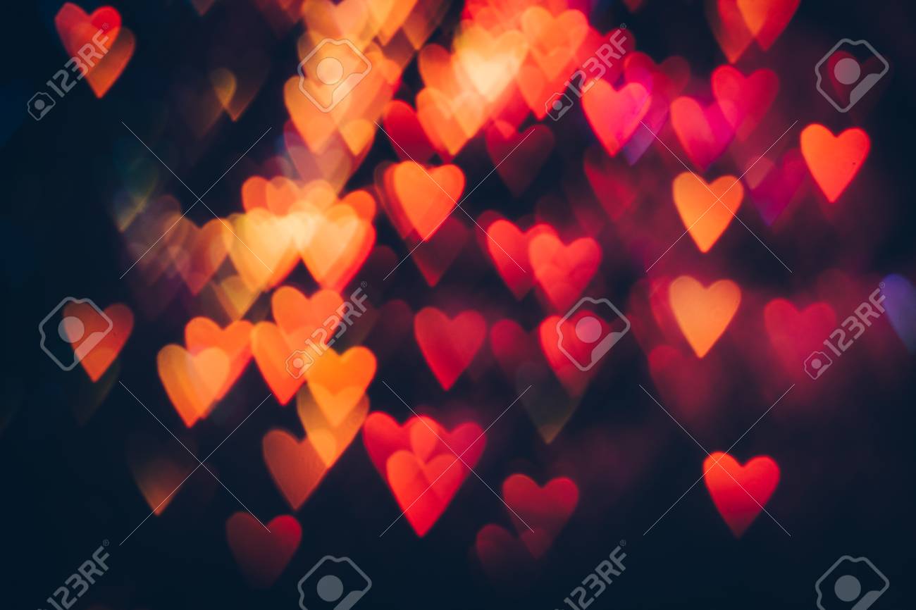 Fondo Abstracto De Corazones De Colores Sobre Fondo Negro Bokeh De Brillos Desenfocados Simbolos De Amor Rosados Y Anaranjados Borrosos Fondo De Pantalla Festivo De Fiestas Y Celebraciones Dia De San Valentin