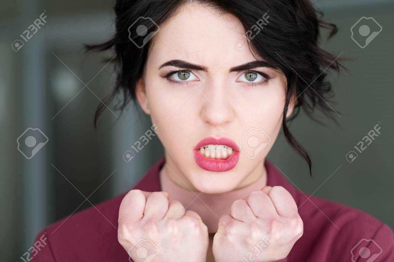 Emotion Face. Furious Angry Woman In Rage Baring The Teeth. Young Beautiful  Brunette Girl Portrait Stock Photo, Picture And Royalty Free Image. Image  103613379.
