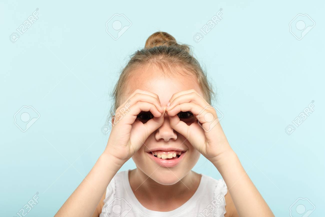 look through binoculars