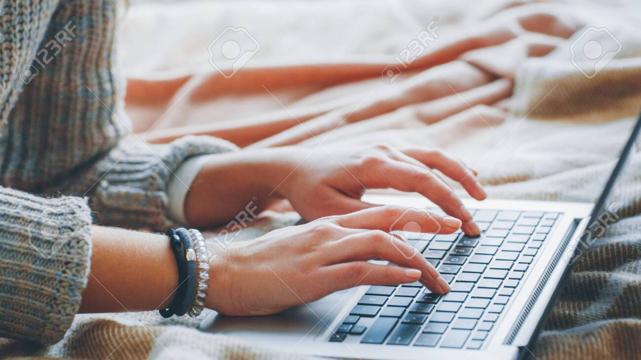 Remote job. Freelance technical content writer. Woman working from home. Closeup of female hands typing on laptop. - 121262035 Remote job. Freelance technical content writer. Woman working from home. Closeup of female hands typing on laptop. - 121262035