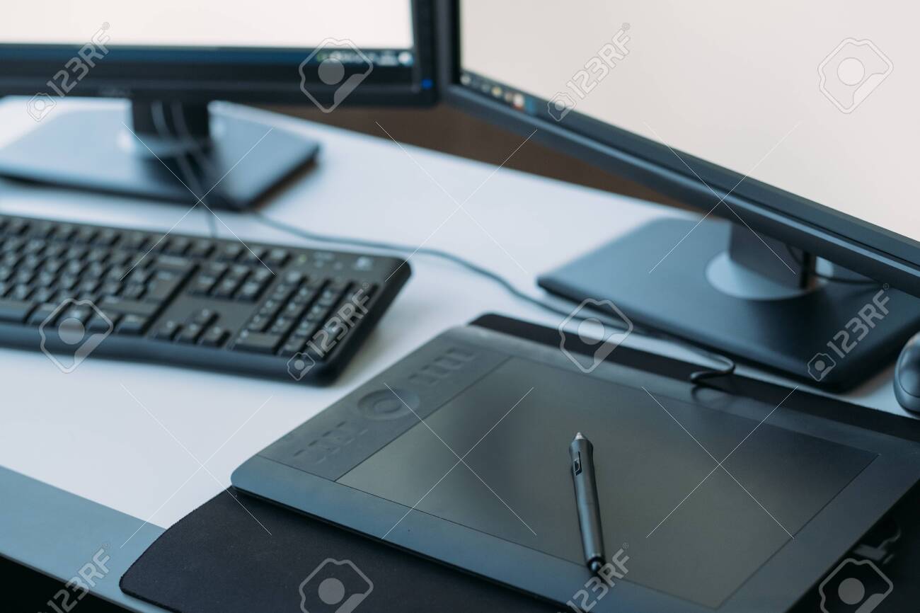 Web graphic design. Creative 3D artist workplace. Top view of tablet, stylus, keyboard on desk. - 127244764 Web graphic design. Creative 3D artist workplace. Top view of tablet, stylus, keyboard on desk. - 127244764