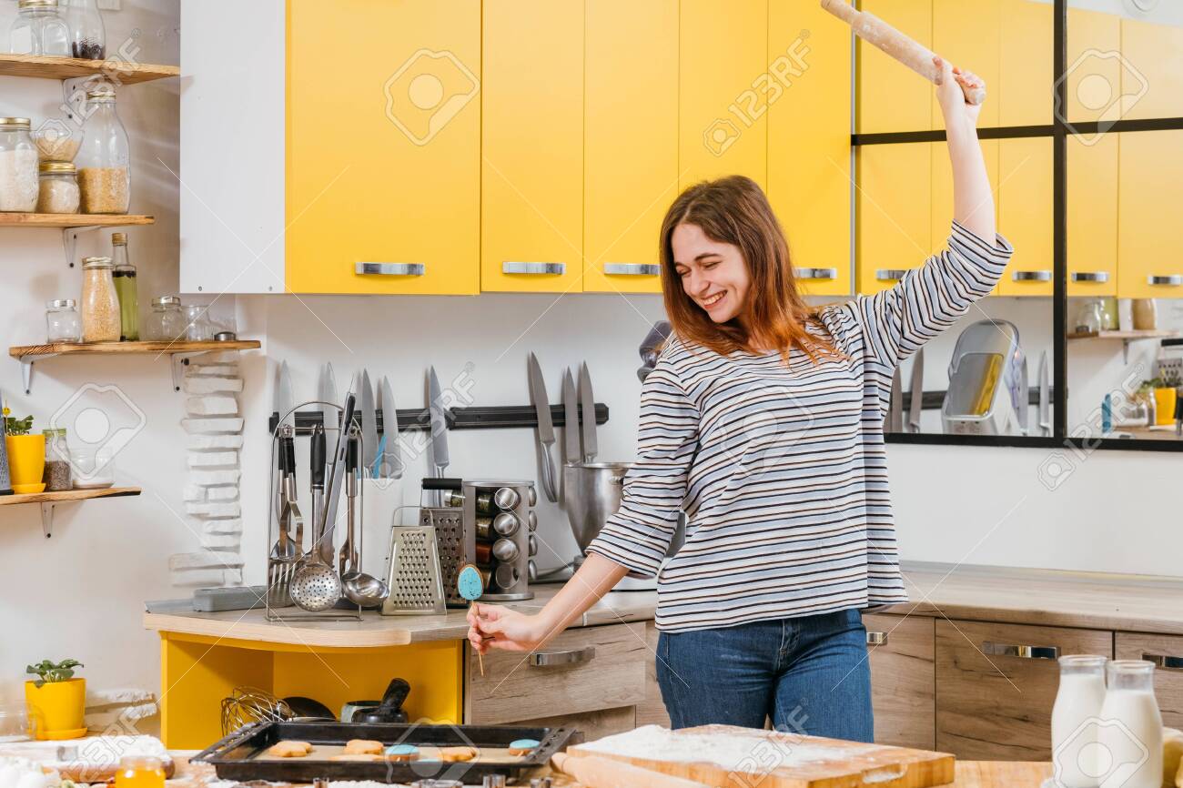Culinary Hobby Lady Having Fun In Kitchen Dancing With Rolling Stock Photo Picture And Royalty Free Image Image 126432532