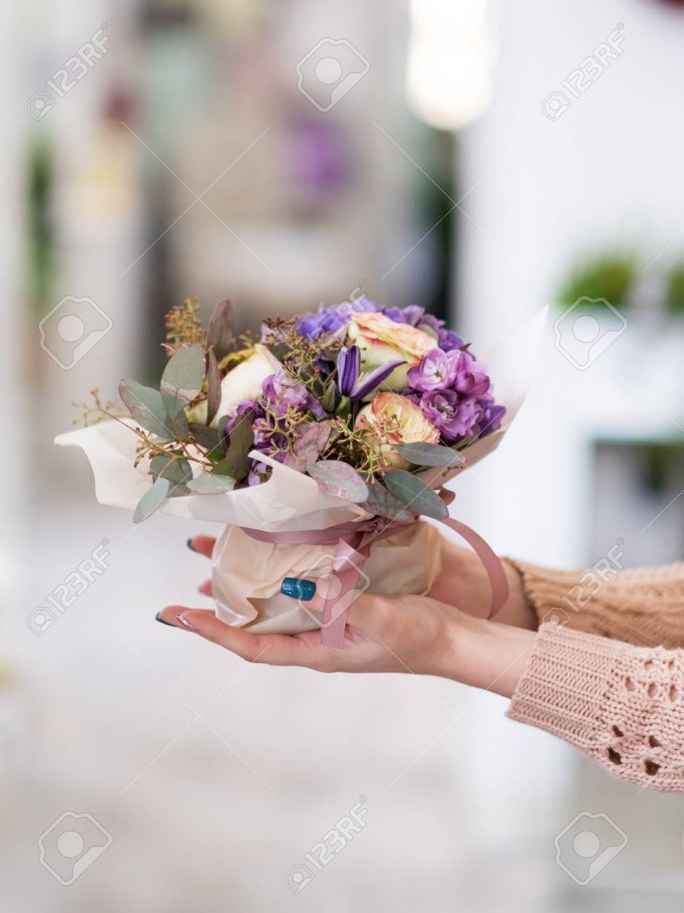 Conveniet Flower Bouquet Delivery For Someone You Love. Women Hands Holding A Creative Arrangement Of Peonies And Hydrangeas Stock Photo, Picture And Royalty Free Image. Image 91522325.