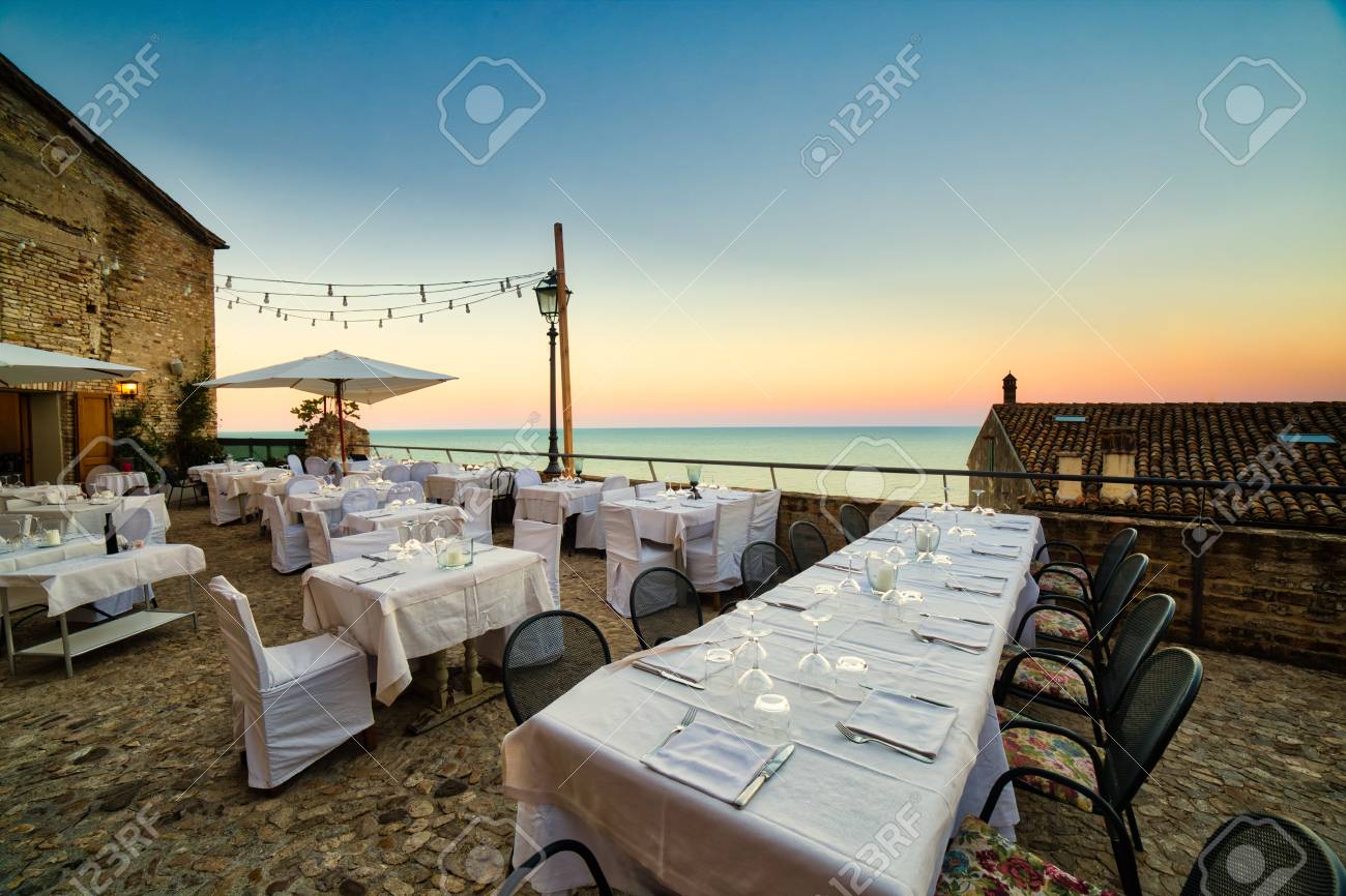 Italian Restaurant With Sea View At Sunset Stock Photo Picture And Royalty Free Image Image 95347174