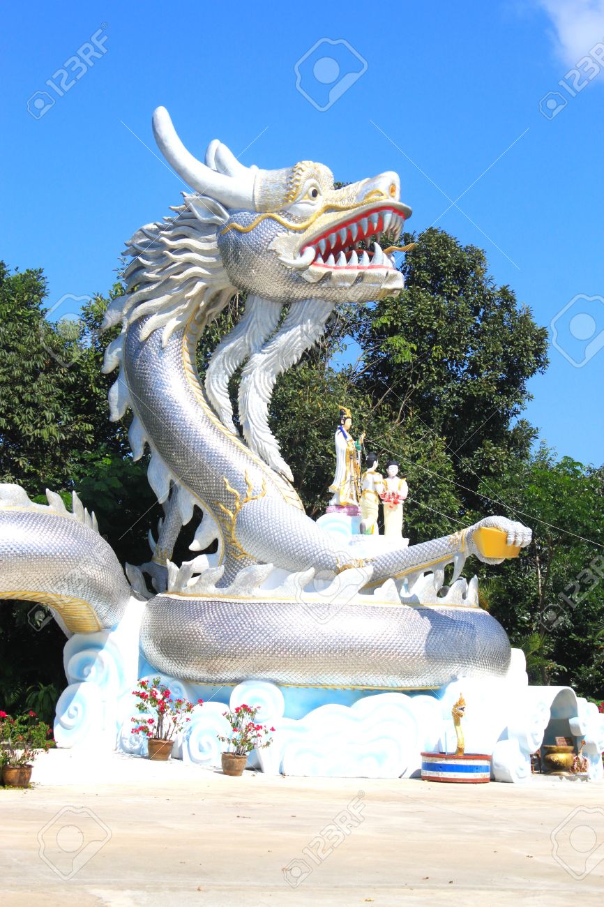 the silver dragon statue in offering gold pose wat tha torn