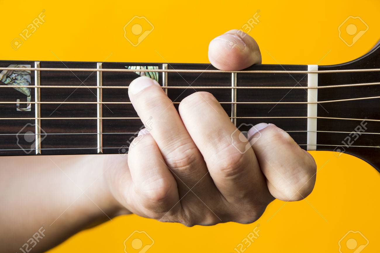 36062955-hand-performing-c-major-chord-o