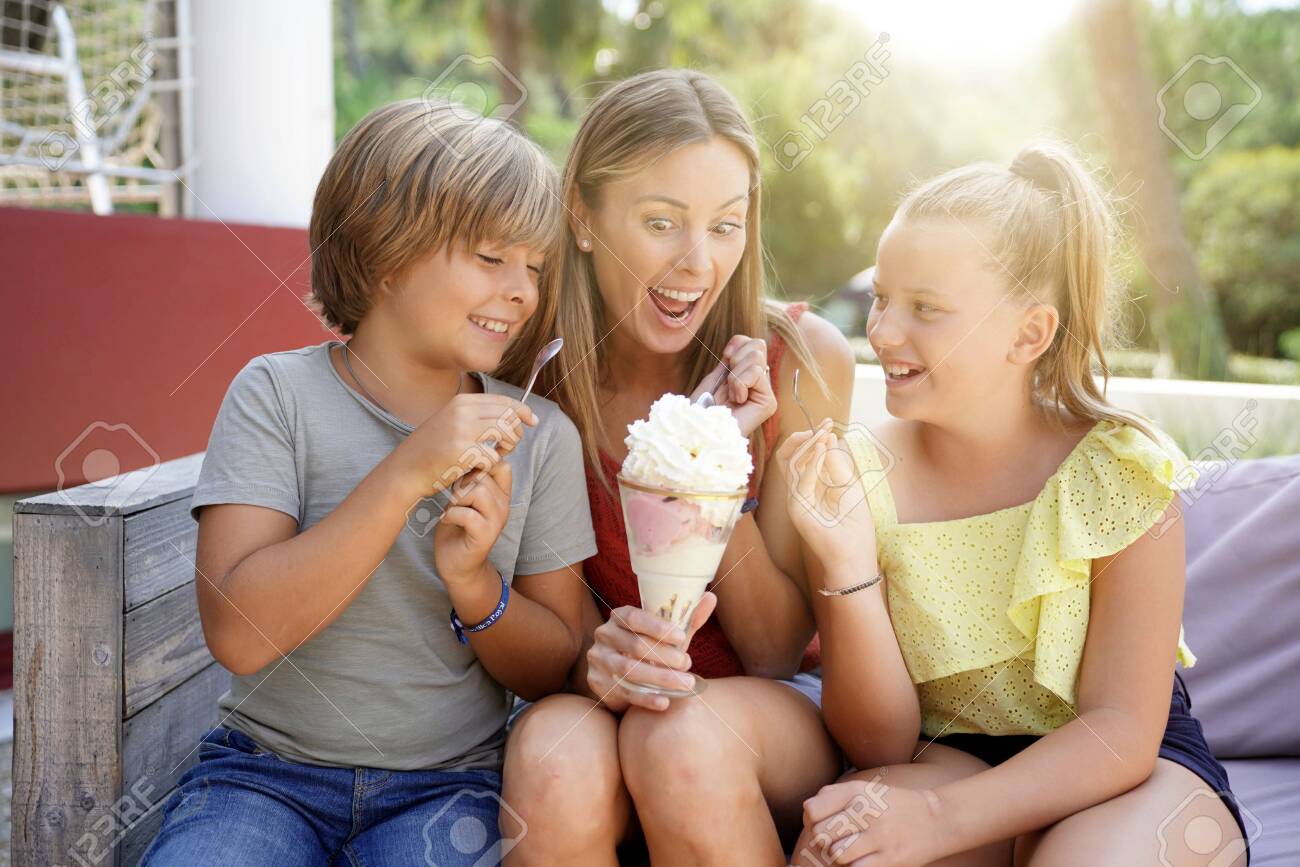 Mother And Kids Eating Ice Cream Stock Photo Picture And Royalty Free Image Image 129862478