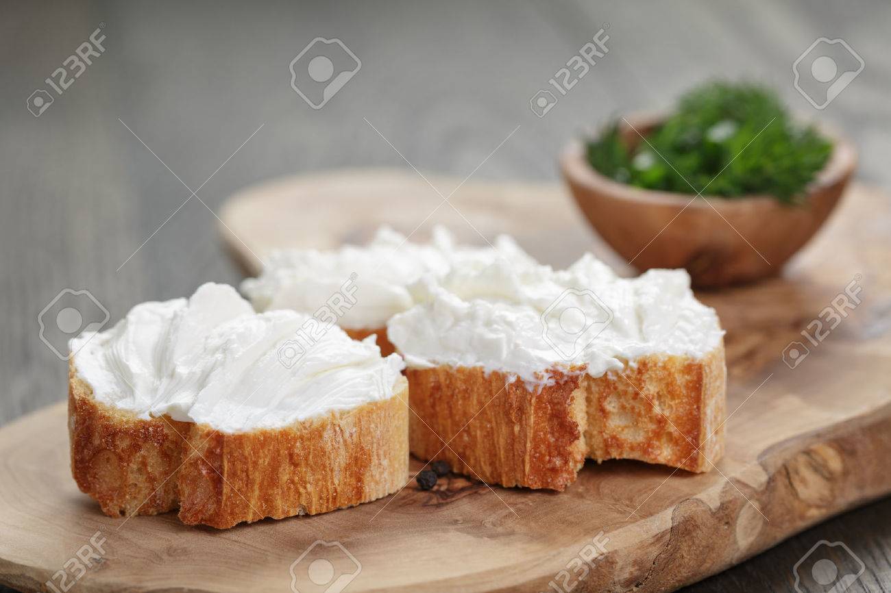 homemade appetizing crostini with soft cheese cream herbs - 38676155 homemade appetizing crostini with soft cheese cream herbs - 38676155