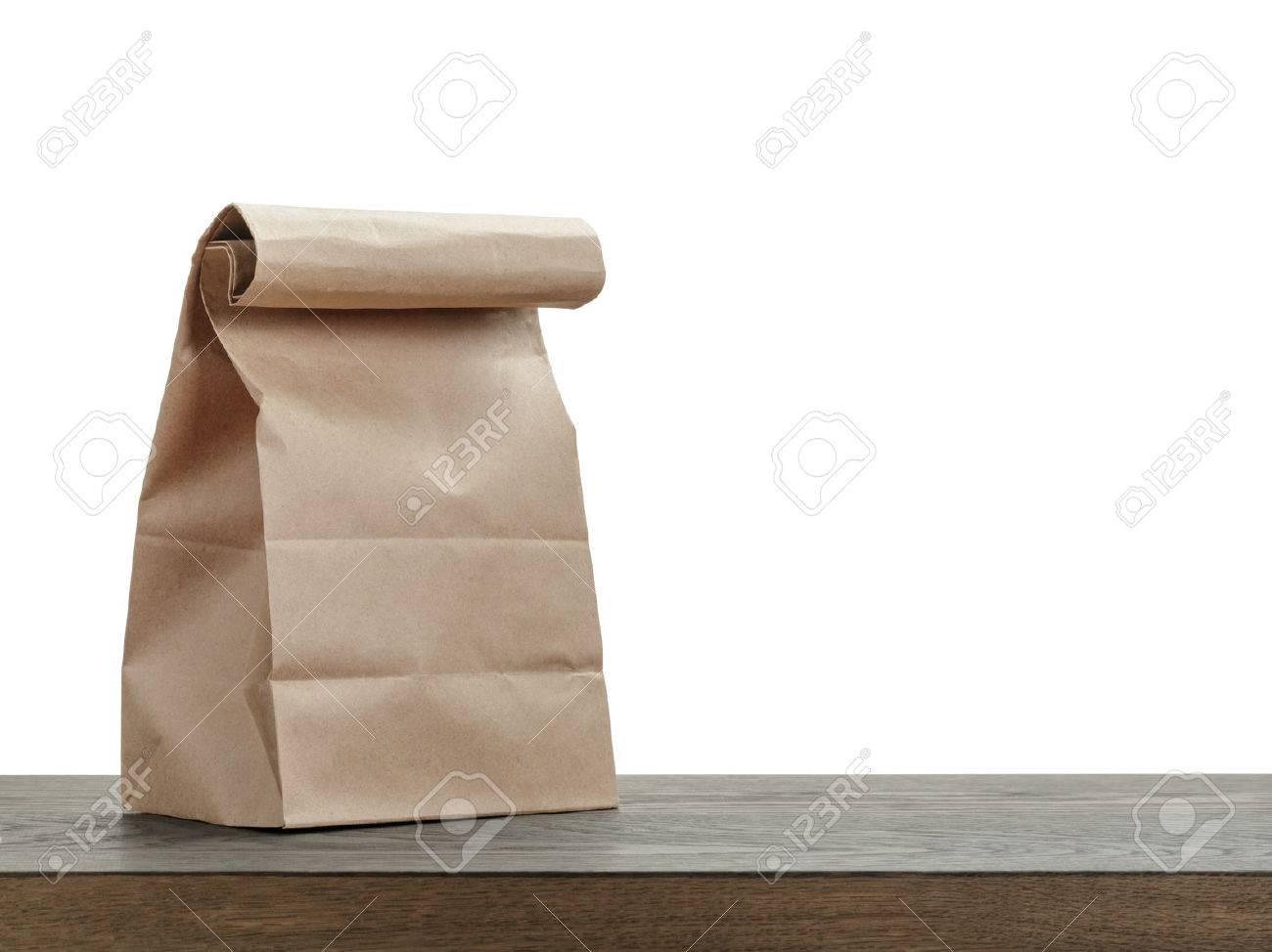 simple brown paper bag for lunch or food on wooden table - 39104958 simple brown paper bag for lunch or food on wooden table - 39104958