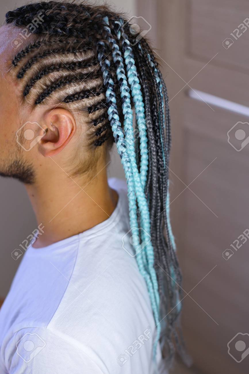Thin Braids In African Style French Braids On The Head Of A
