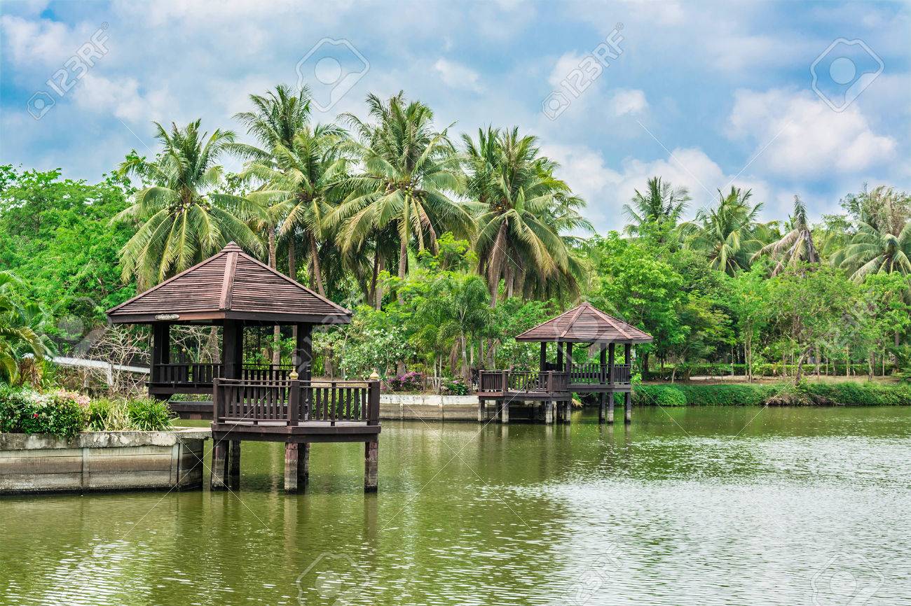 Beautiful Riverside Landscape With Palm Trees And Resting Pavilion In Thailand Stock Photo Picture And Royalty Free Image Image 29069406