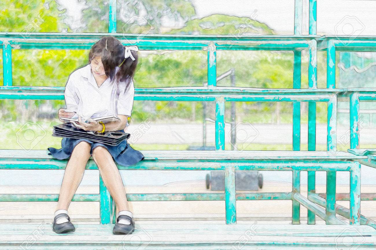 かわいいアジア タイ女子高生制服生の描く水彩画イラスト スケッチが座っていると読書本を読む金属製スタンド の写真素材 画像素材 Image