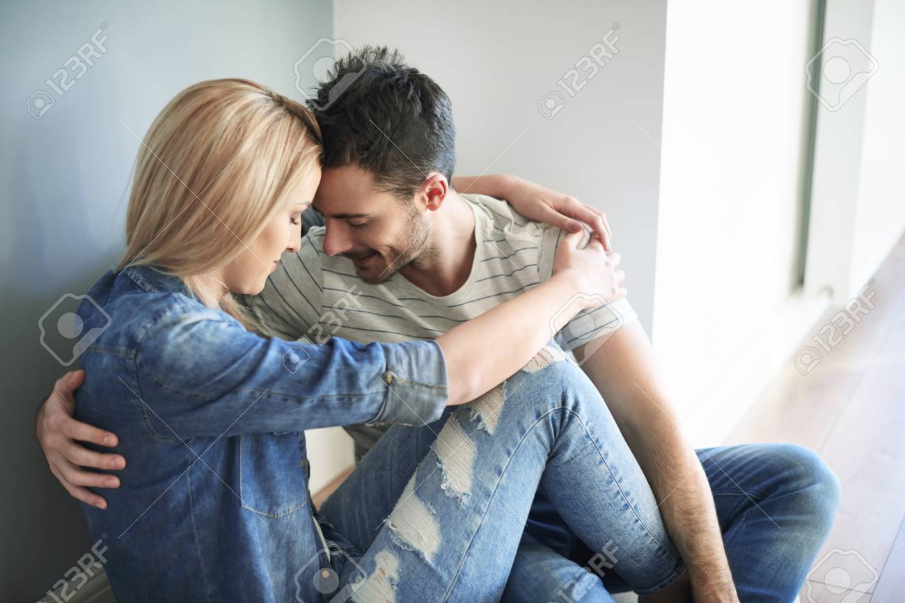 Close up of couple in their new flat - 68525392 Close up of couple in their new flat - 68525392