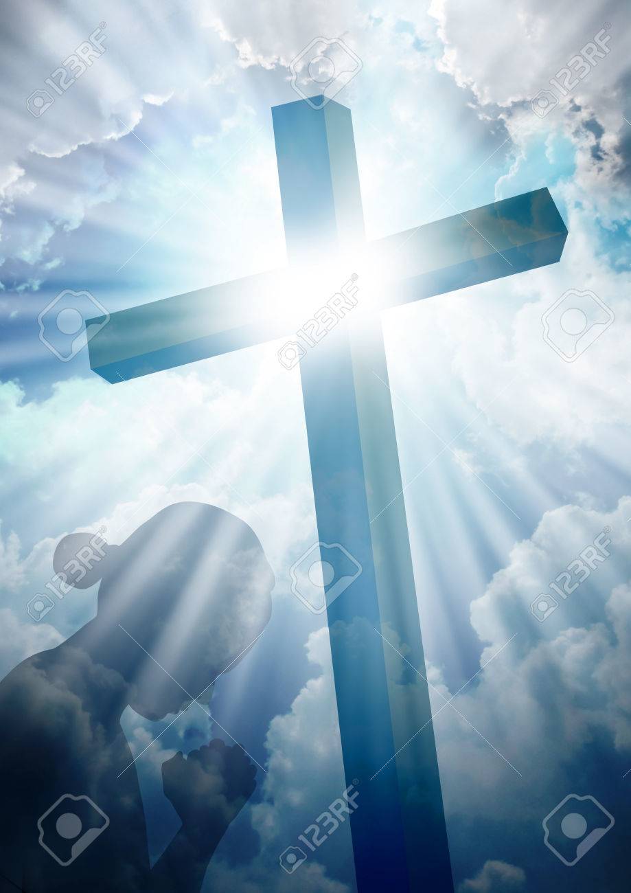 Silhouette Of A Women Praying Under The Cross Stock Photo, Picture and  Royalty Free Image. Image 55090721., image size:919x1300