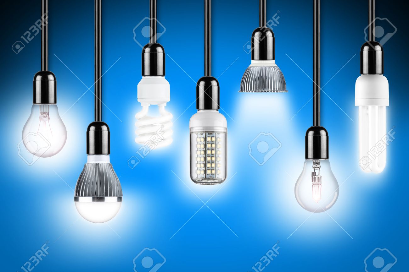 row of different types of glowing light bulbs stock photo picture