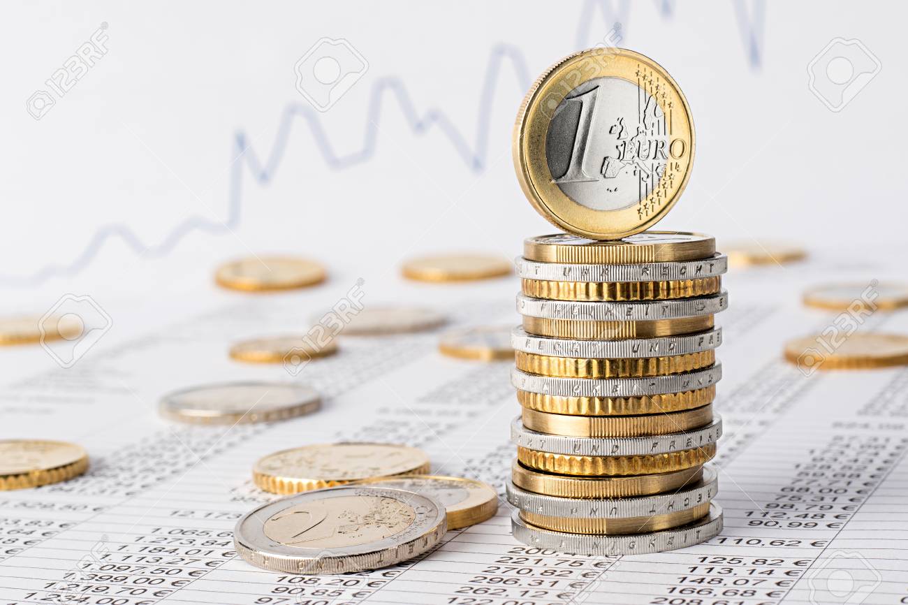 finance business accounting stock background with stack of euro coins on data sheet - 76530843 finance business accounting stock background with stack of euro coins on data sheet - 76530843