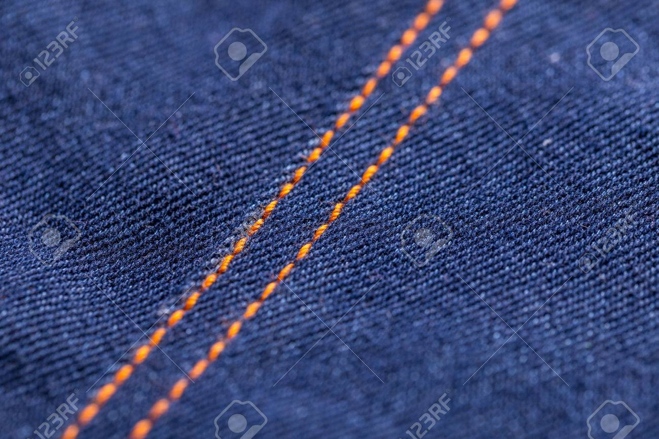 jeans with orange stitching