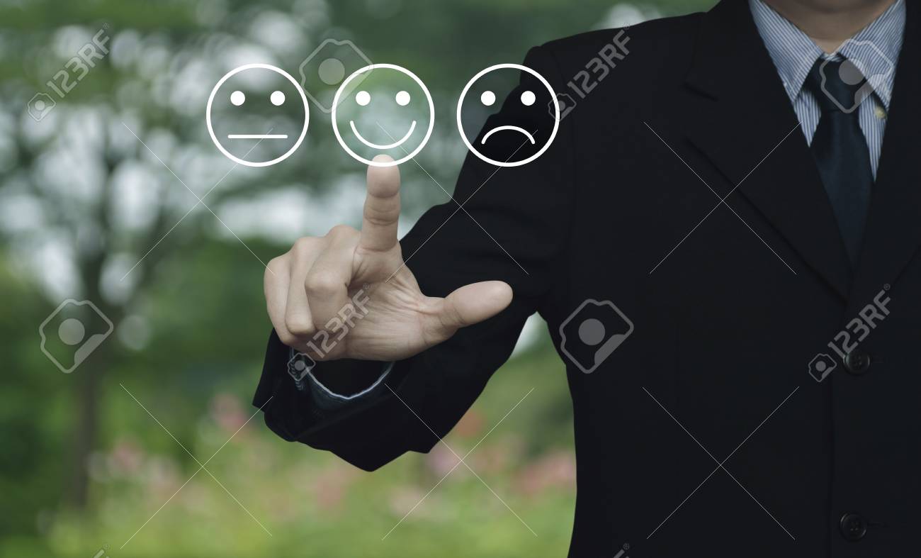Businessman Pressing Excellent Smiley Face Rating Icon Over Blur Stock Photo Picture And Royalty Free Image Image