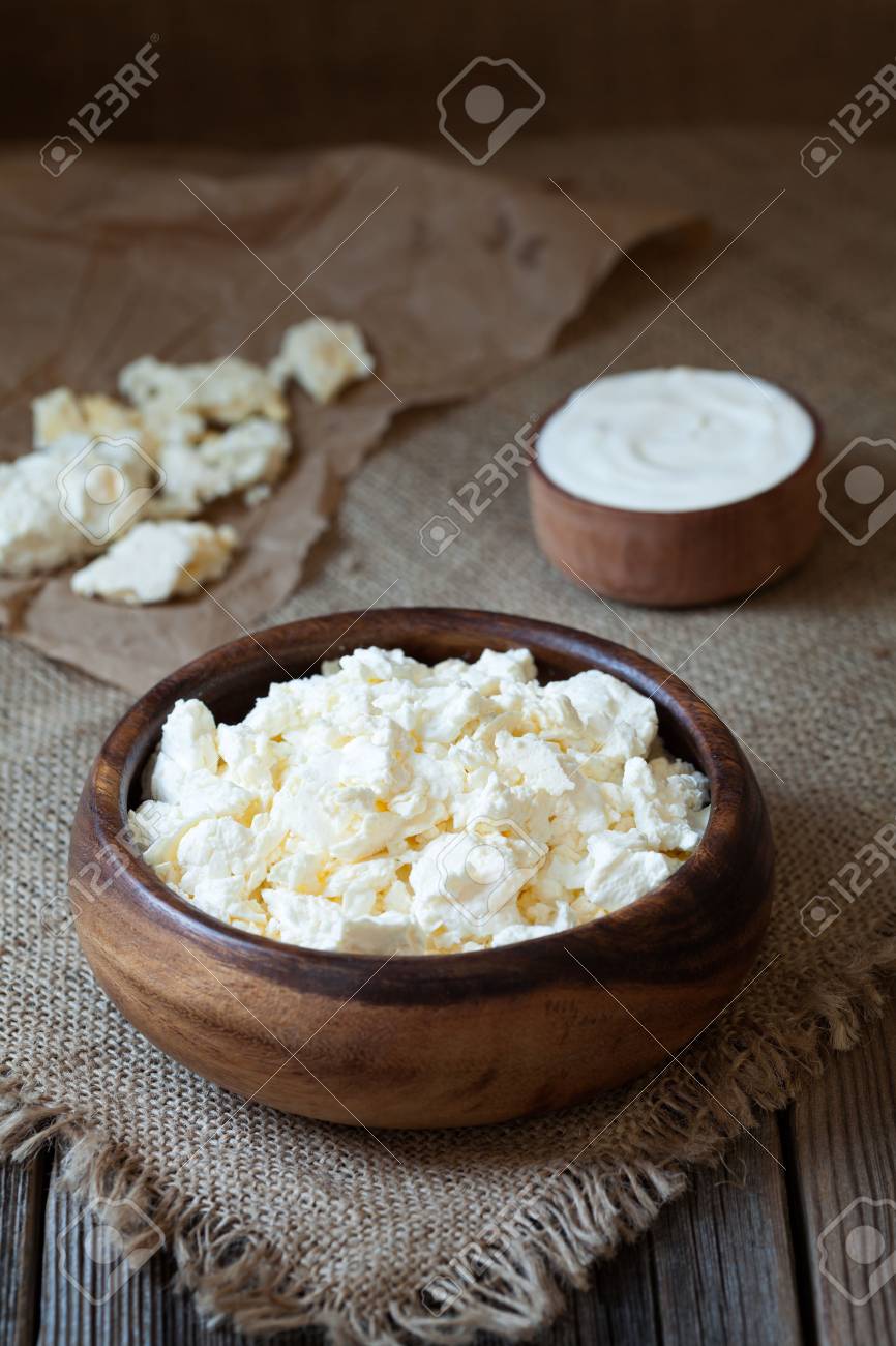 Traditional Homemade Cottage Cheese With Sour Cream In Rustic