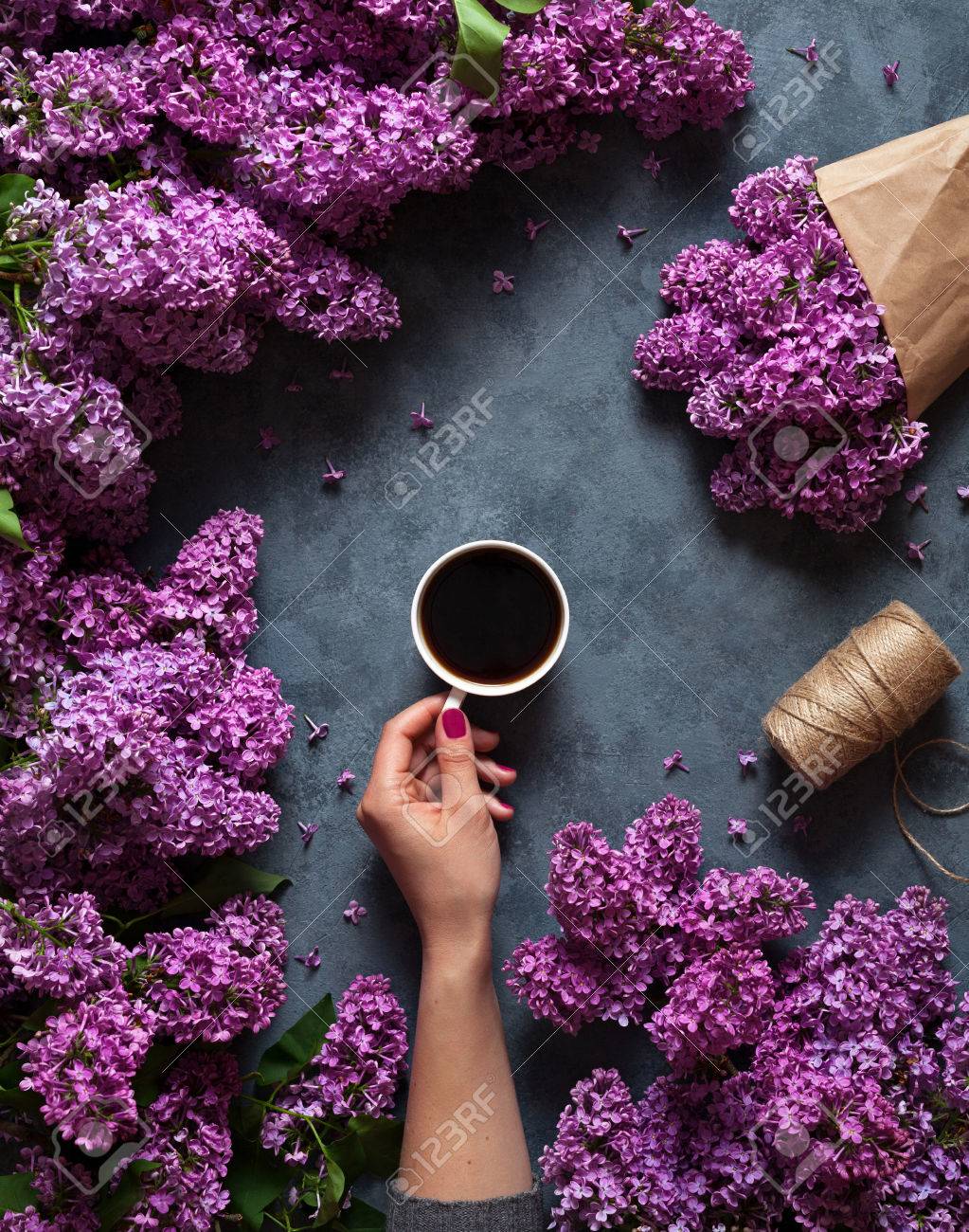 Coffee Mug With Bouquet Of Flowers Spring Lilac Branches Blossoming Stock Photo Picture And Royalty Free Image Image 76349777