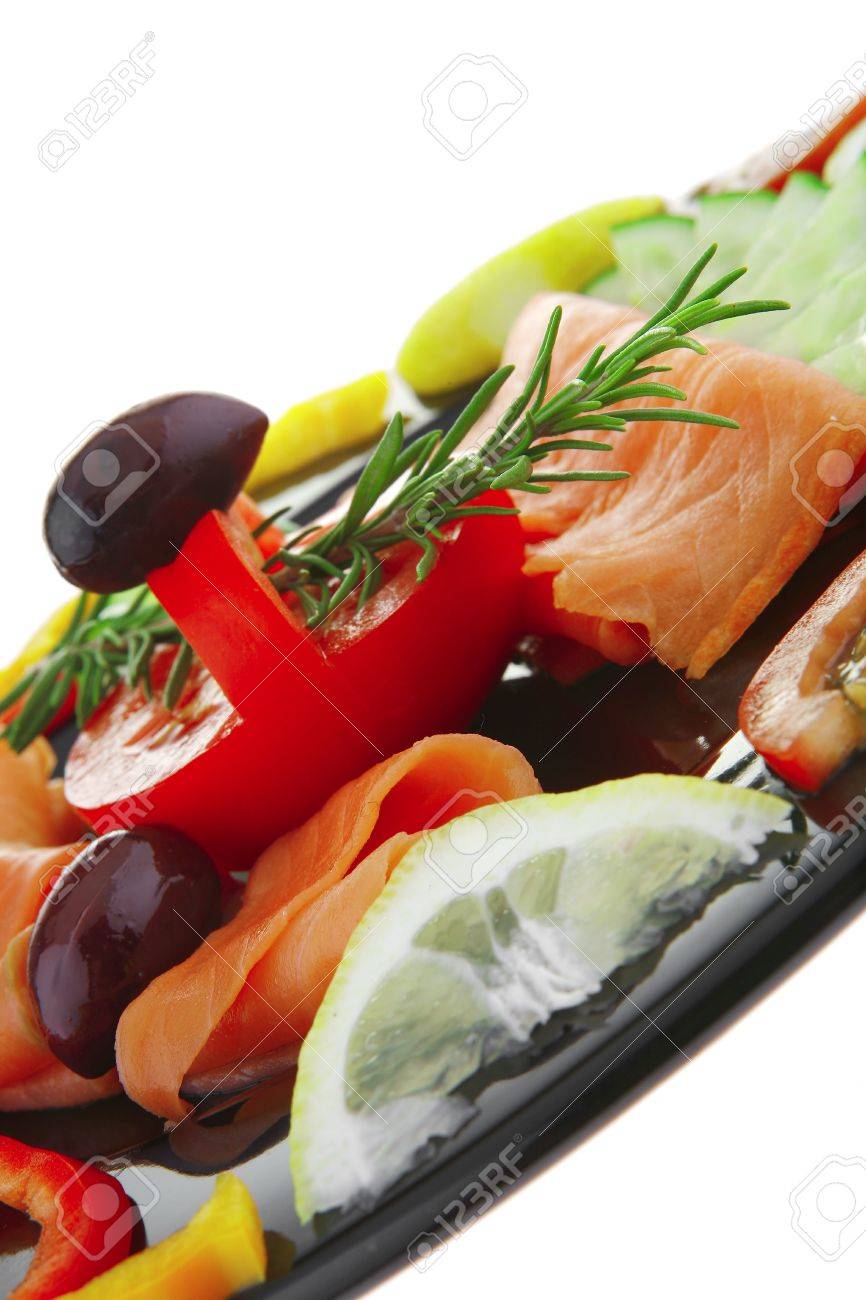 image of served salmon slices with tomatoes and peppers - 7255476 image of served salmon slices with tomatoes and peppers - 7255476