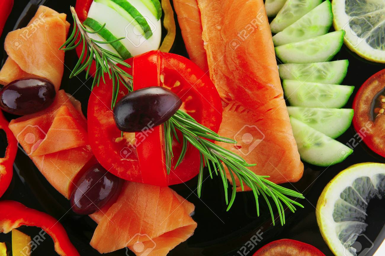 image of served salmon slices with tomatoes and peppers - 7878932 image of served salmon slices with tomatoes and peppers - 7878932