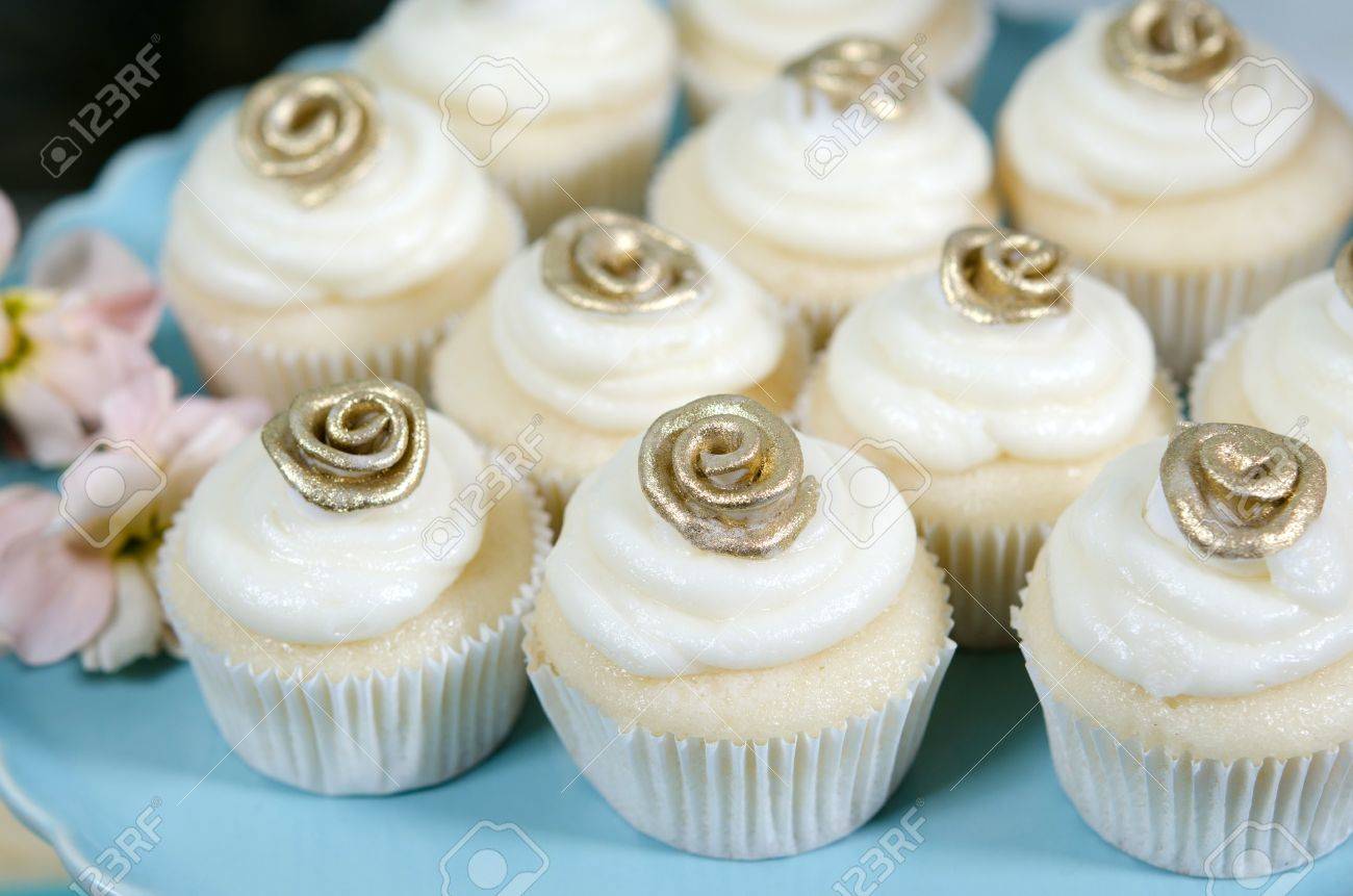 Image of beautifully decorated wedding cupcakes on a plate Stock Photo - 13493937
