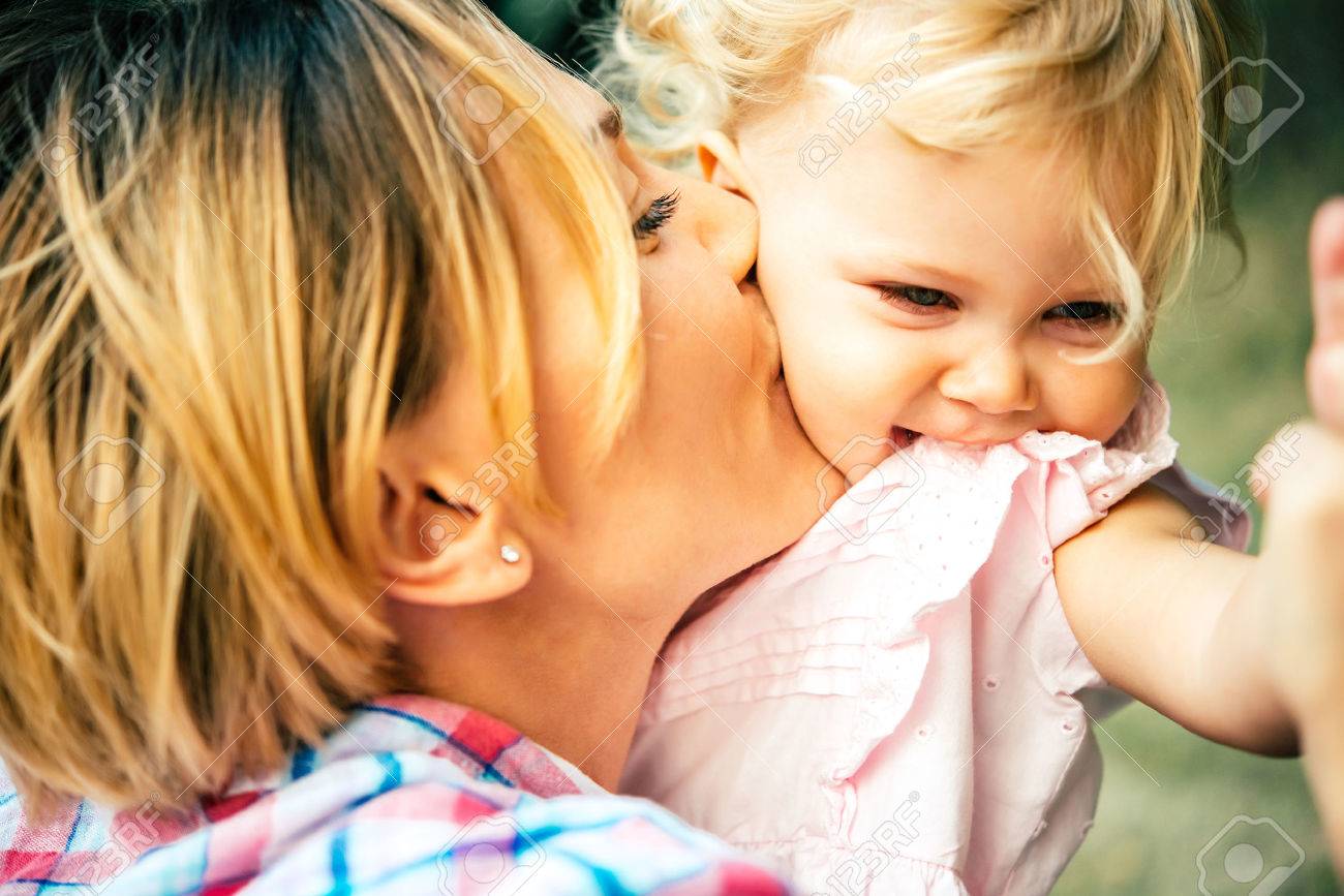 Young beautiful mother has fun with her daughter - 50842591 Young beautiful mother has fun with her daughter - 50842591