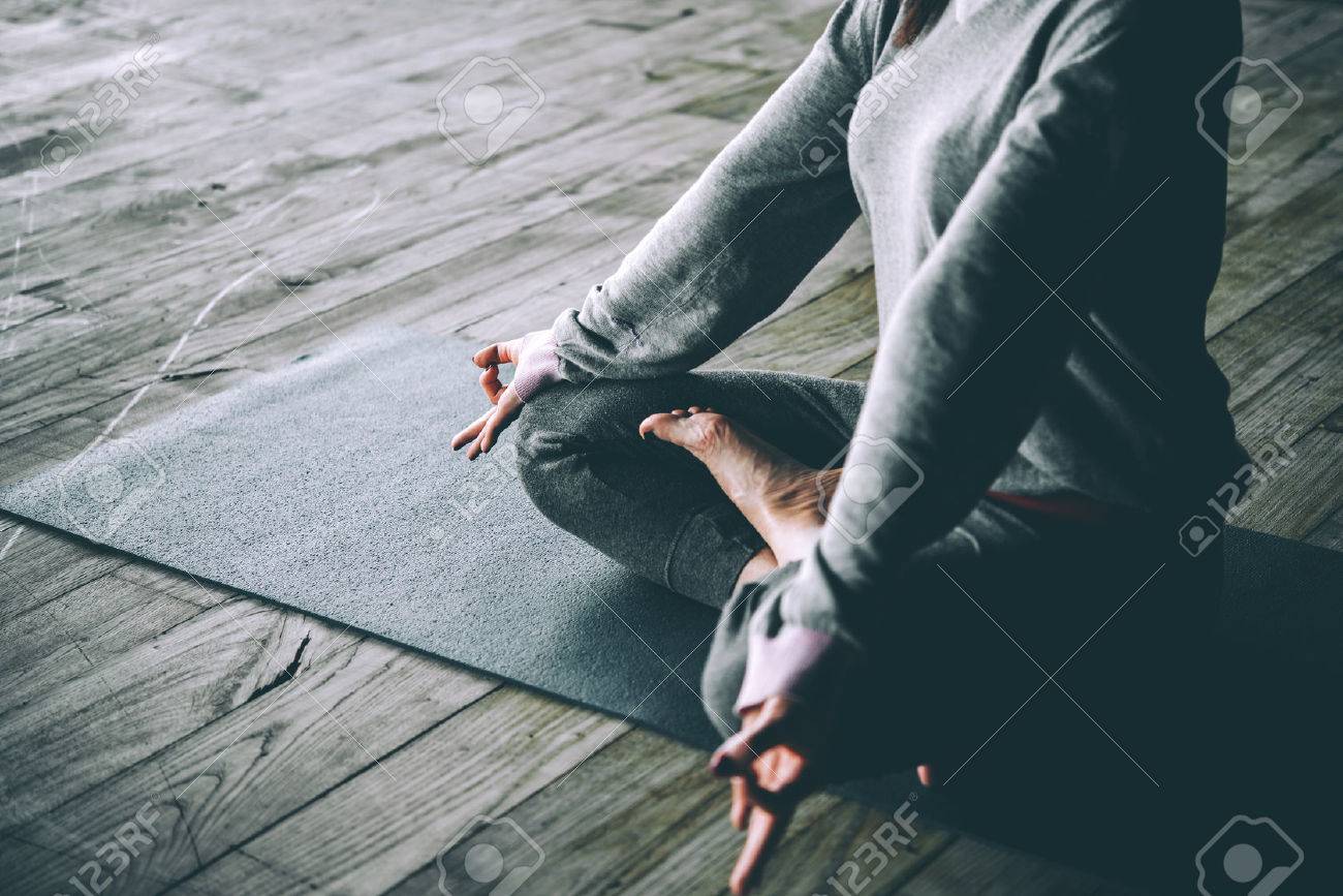 Young woman meditates while practicing yoga. Freedom concept. Calmness and relax, woman happiness. Toned picture - 58510615 Young woman meditates while practicing yoga. Freedom concept. Calmness and relax, woman happiness. Toned picture - 58510615