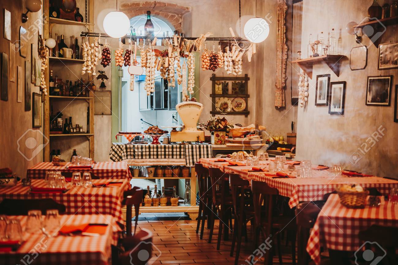 View of a small local restaurant or trattoria in Italy - 98293509 View of a small local restaurant or trattoria in Italy - 98293509